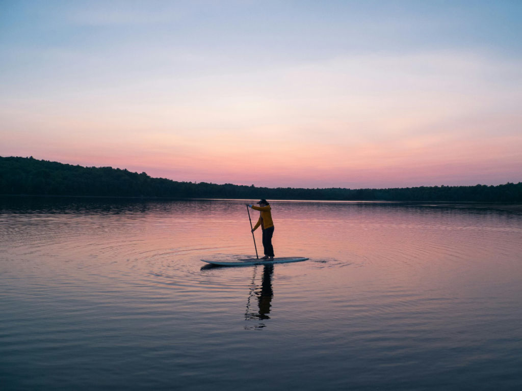 Person Paddleboarding